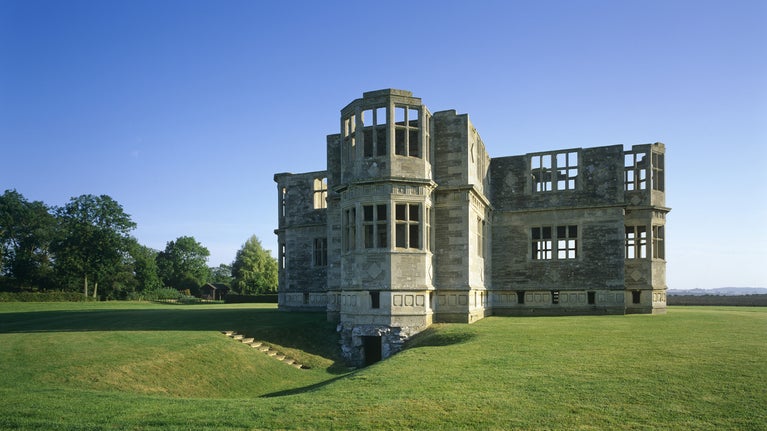 A view of the South and East Wings, showing the entrance door, taken in the early morning. The New Bield is an incomplete C16th. & C17th. retreat, built by Sir Thomas Tresham.Work ceased in 1605